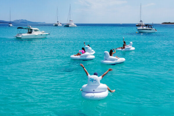 People Group at Sea Enjoying the iMatJet® Inflatable Electric Sofa