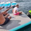 Inflatable Sea Water Platform for rent with 3 people on it