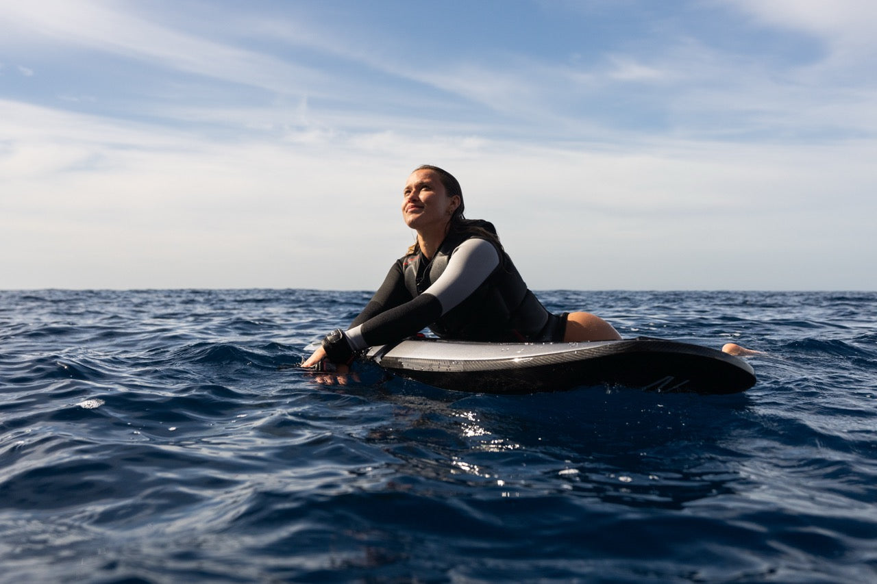Awake VINGA Adventure eFoil Rider Resting on Board